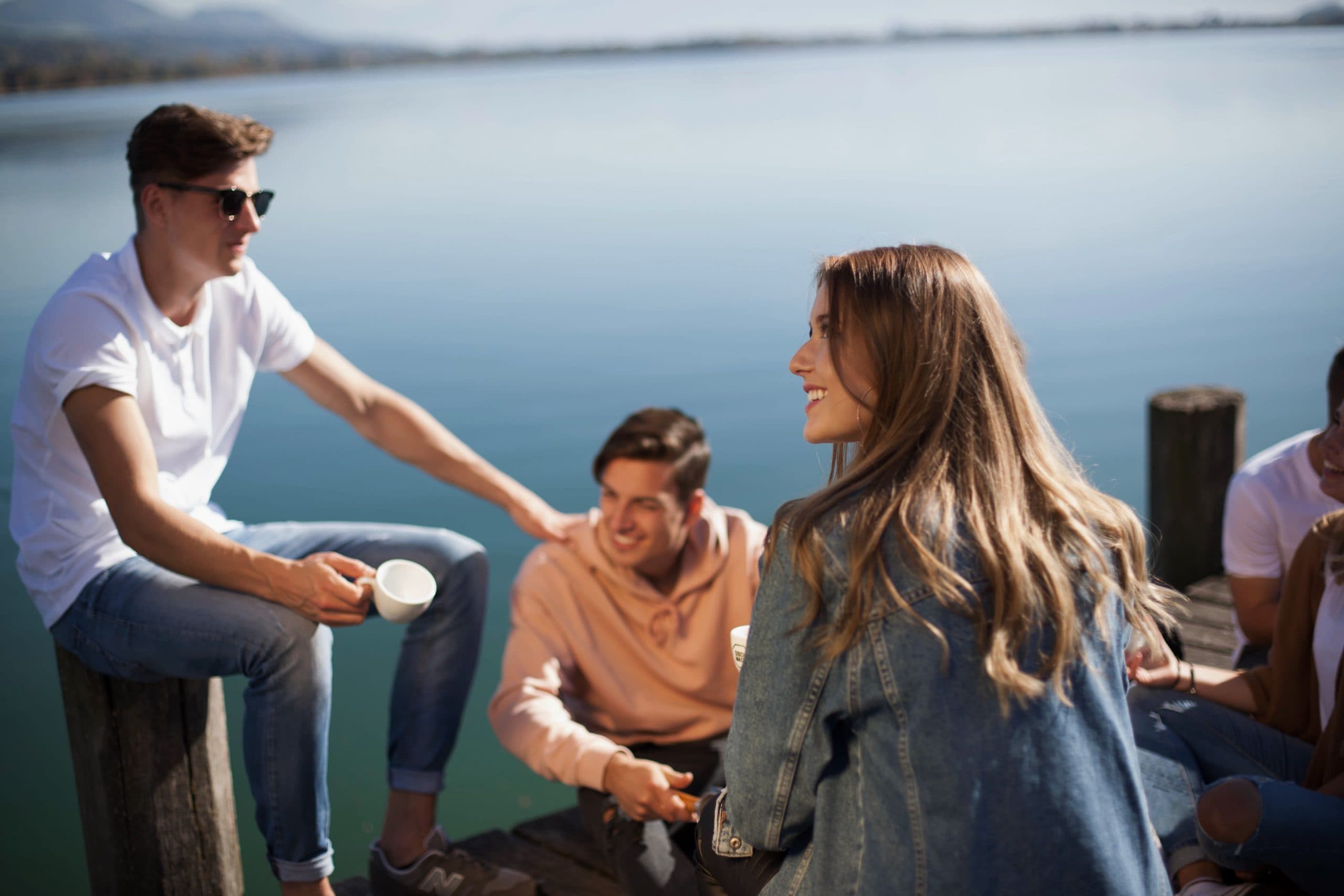 Friends together on a dock